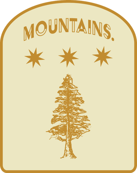 Mountains badge — evergreen tree beneath three stars